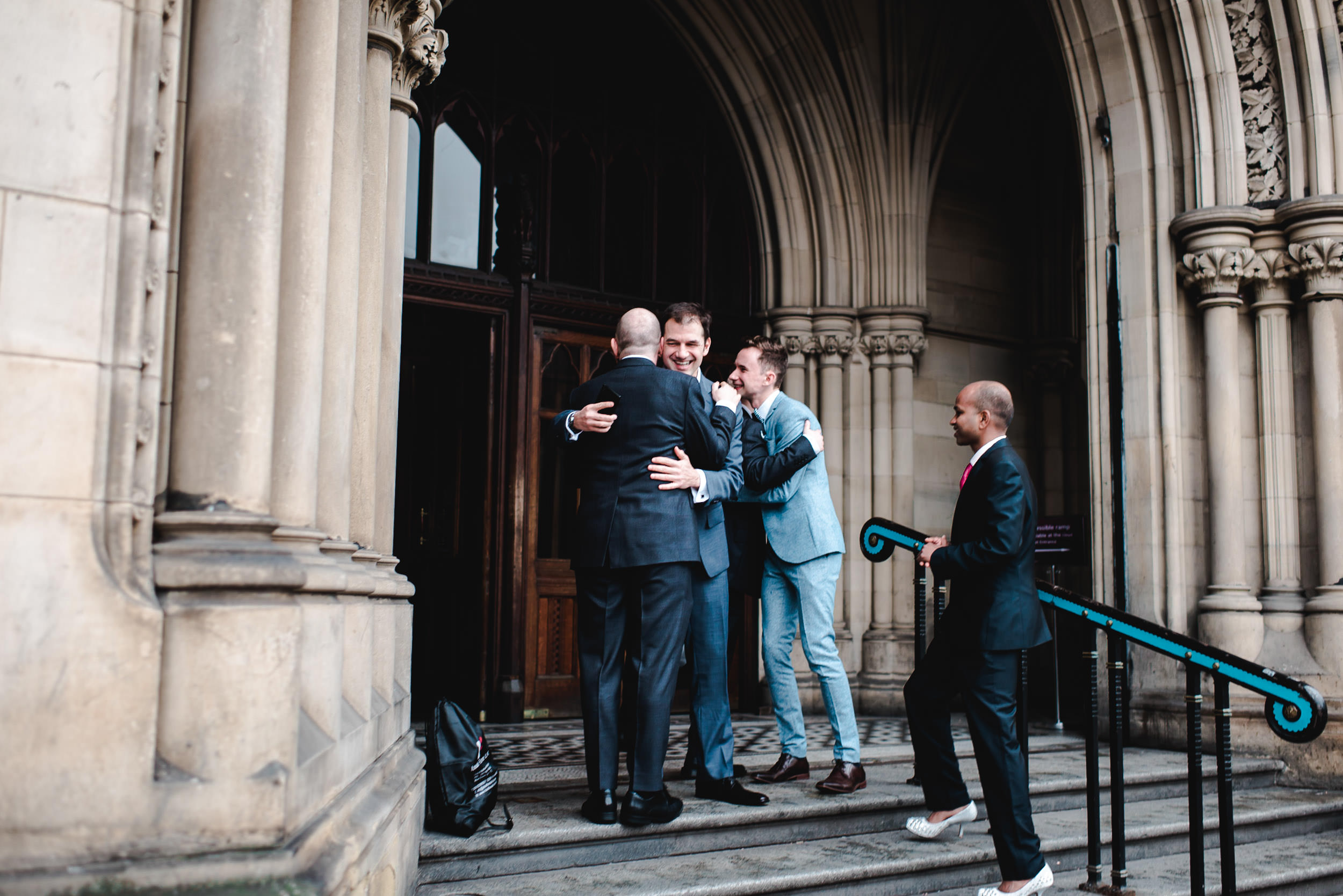 Groom arriving at Manchester Town Hall with a guest