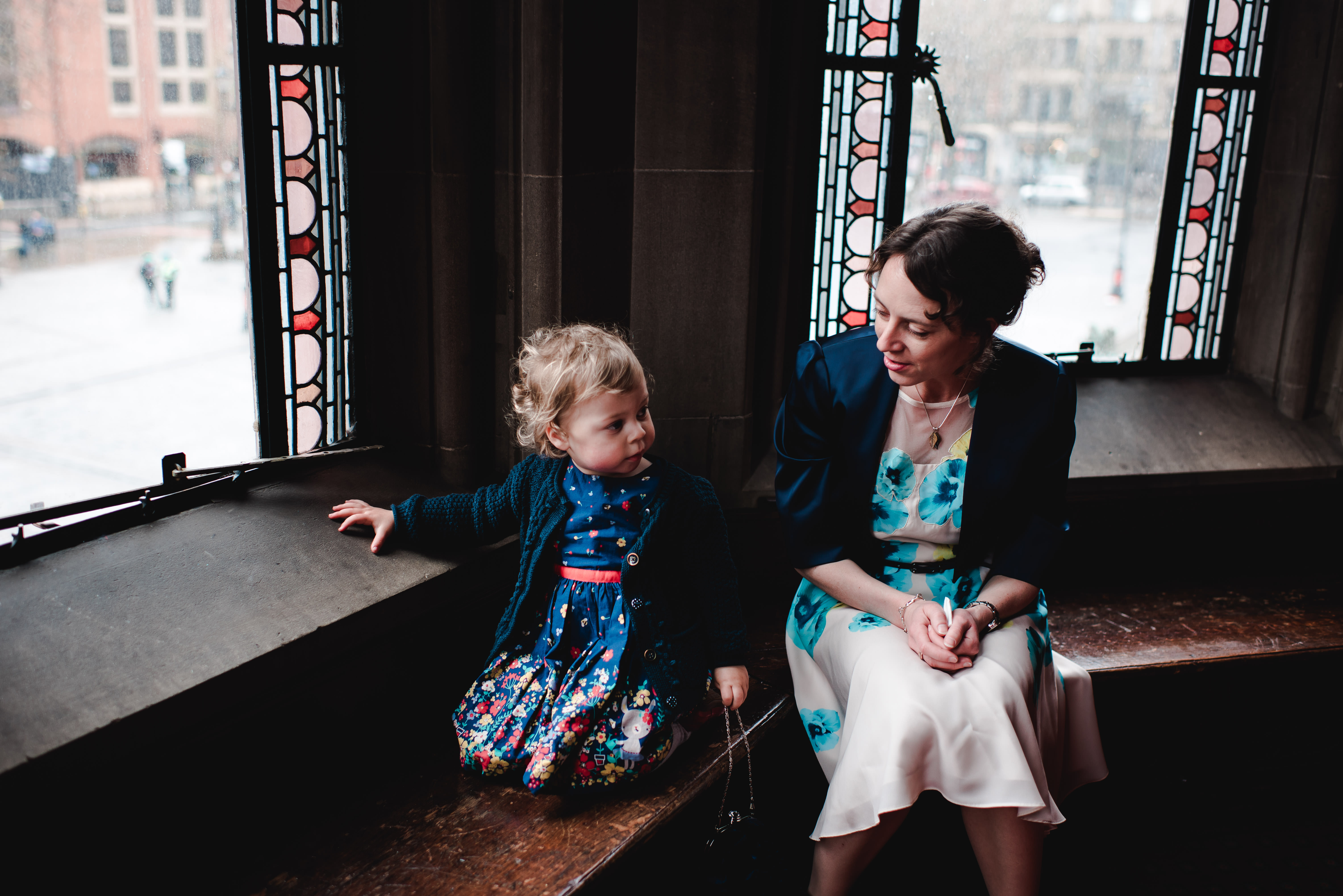 Little girl and Mother at wedding in Manchester Town Hall