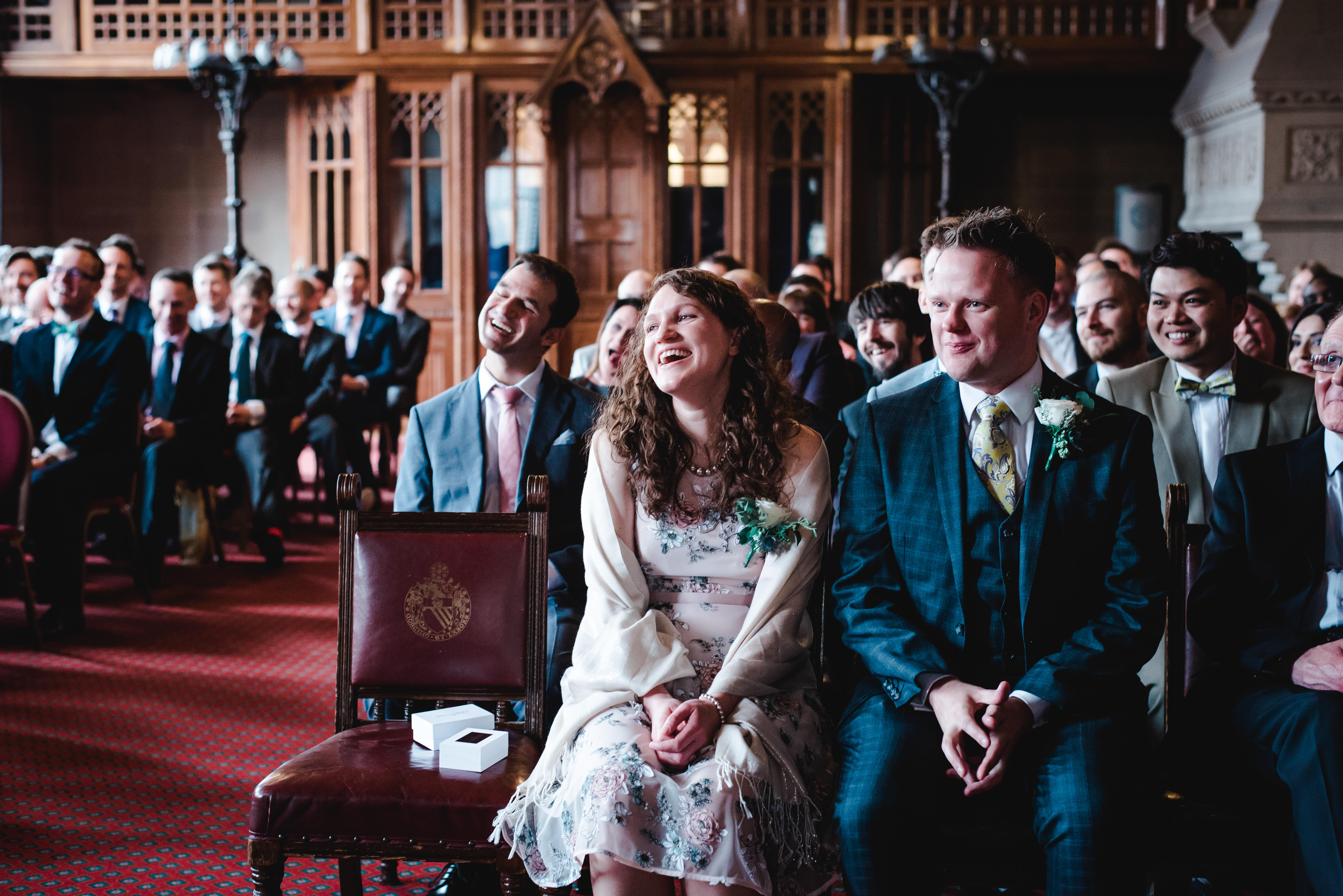 Guest laughing in ceremony at Manchester Town Hall wedding