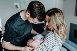 Newborn with Mum and Dad at a Lifestyle Family Photography Session