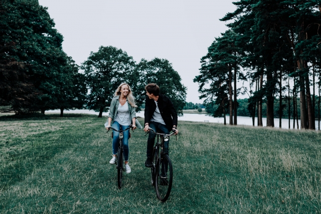 Lauren and Christopher on their vintage bikes at Cheshire Engagement Session