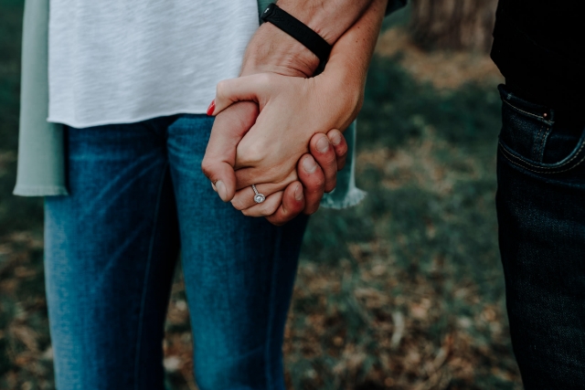 Lauren and Christopher holding hands at their Cheshire Engagement Session